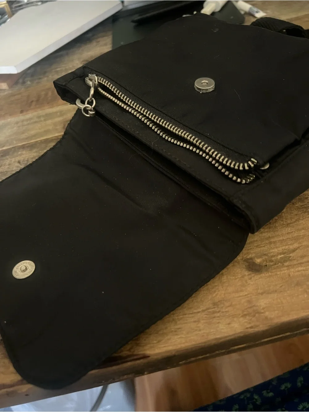 Black Crossbody Shoulder Bag with Winged Emblem by Nicole Miller